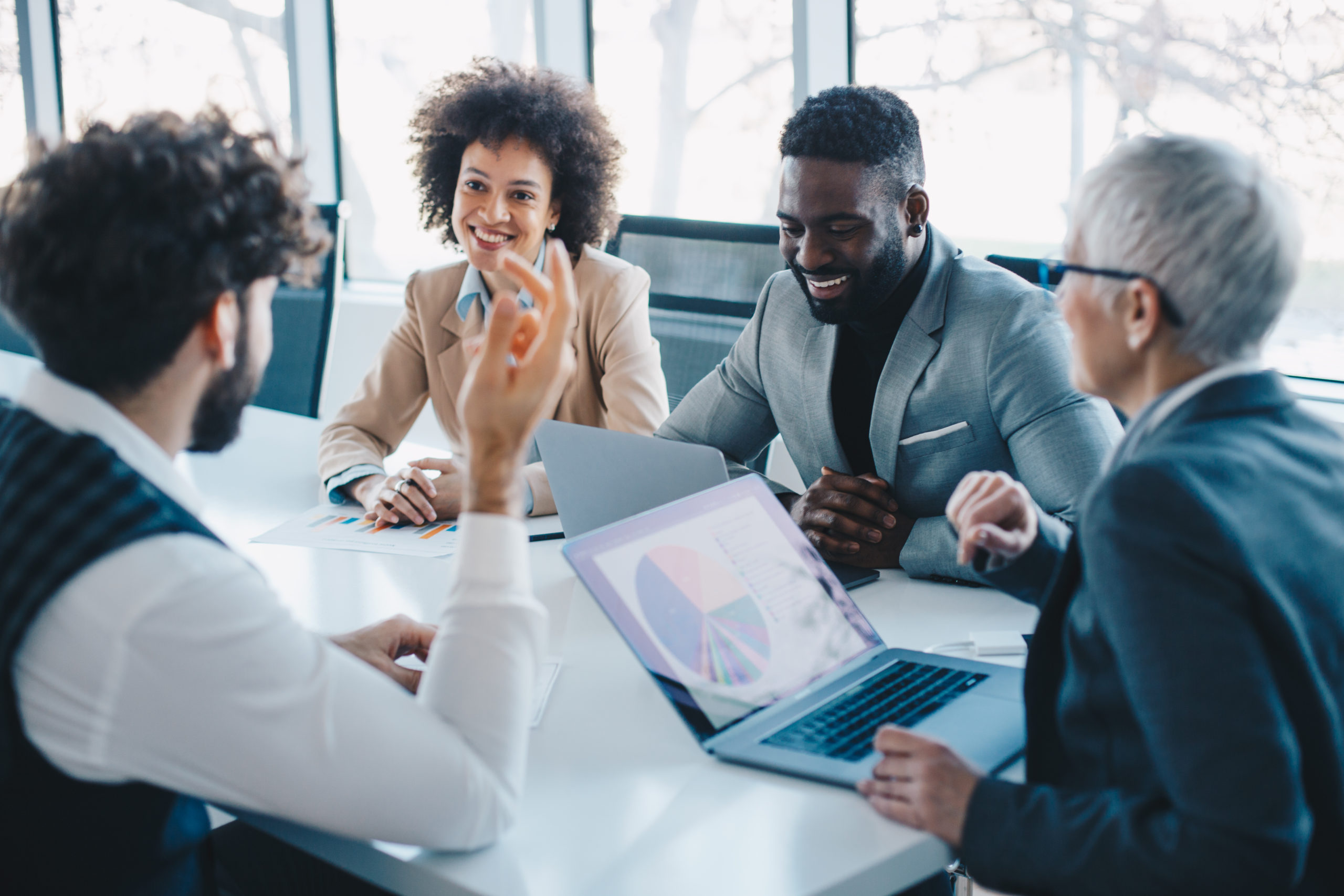 Team working together around a desk