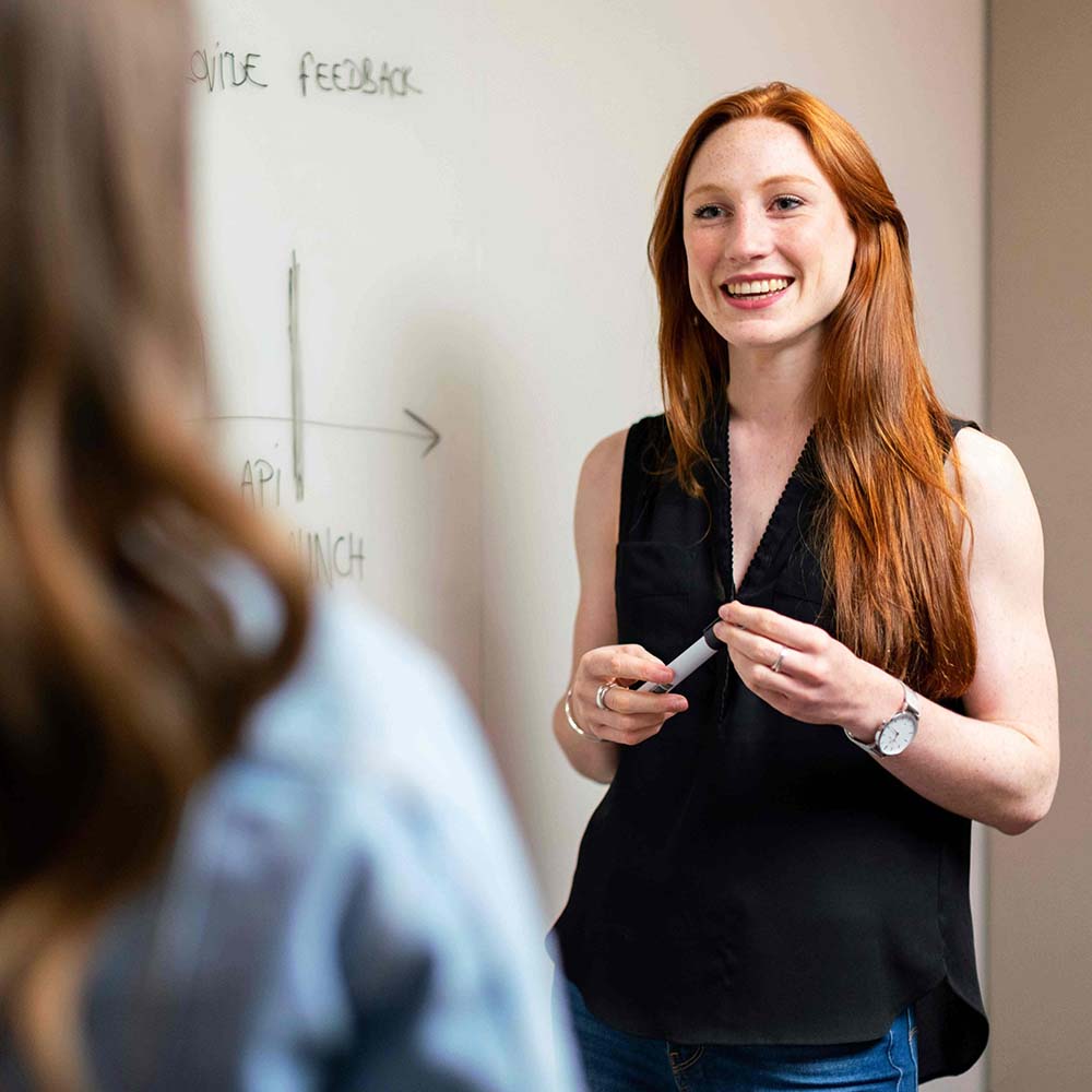 redhead woman standing